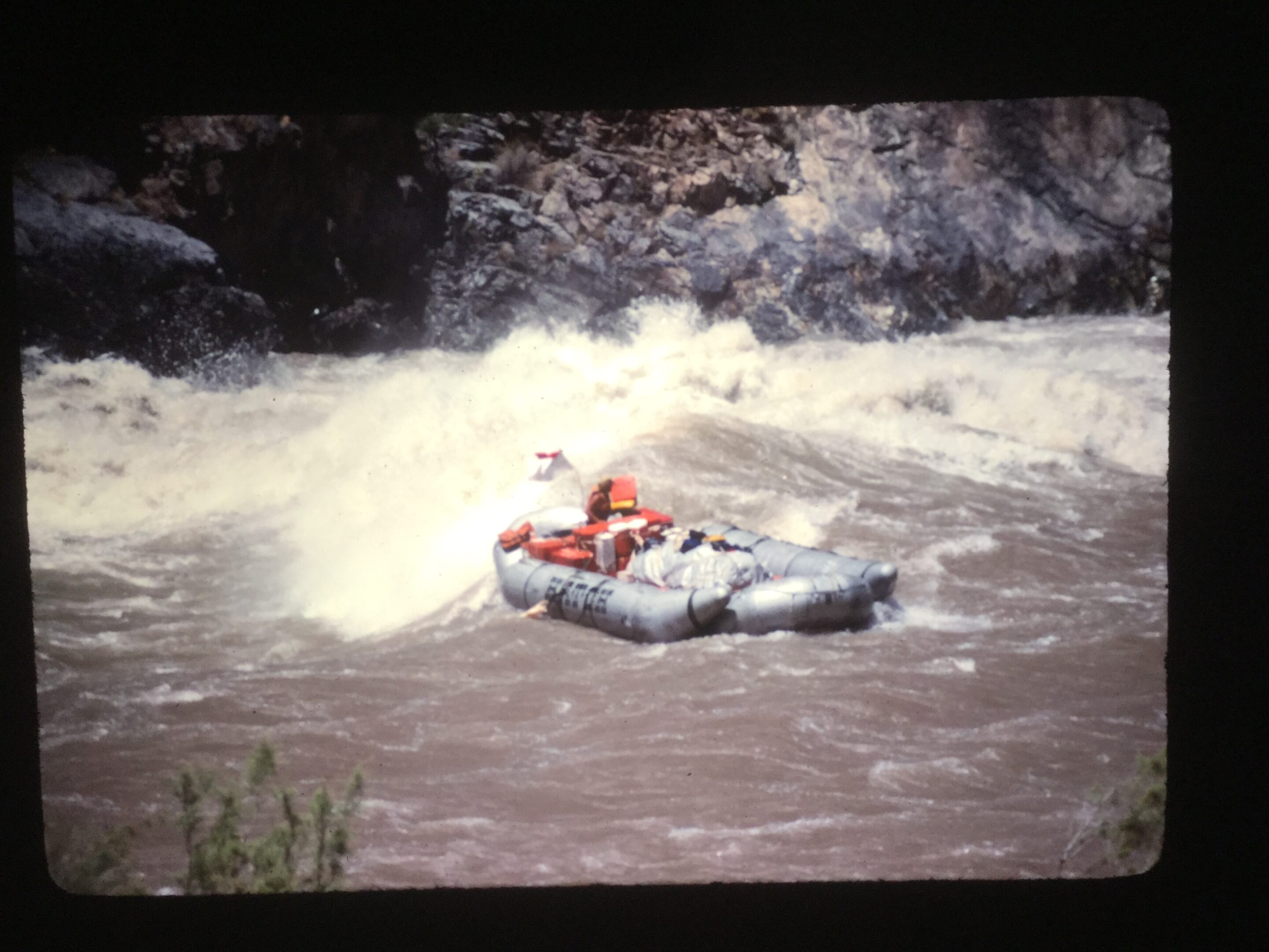 A Hatch boat navigating the intense rapids in the Colorado River during the 1983 flood.