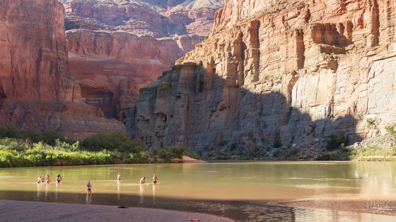 people playing in Colorado River on Hatch River Expeditions 6 Day Upper Grand Canyon Trip