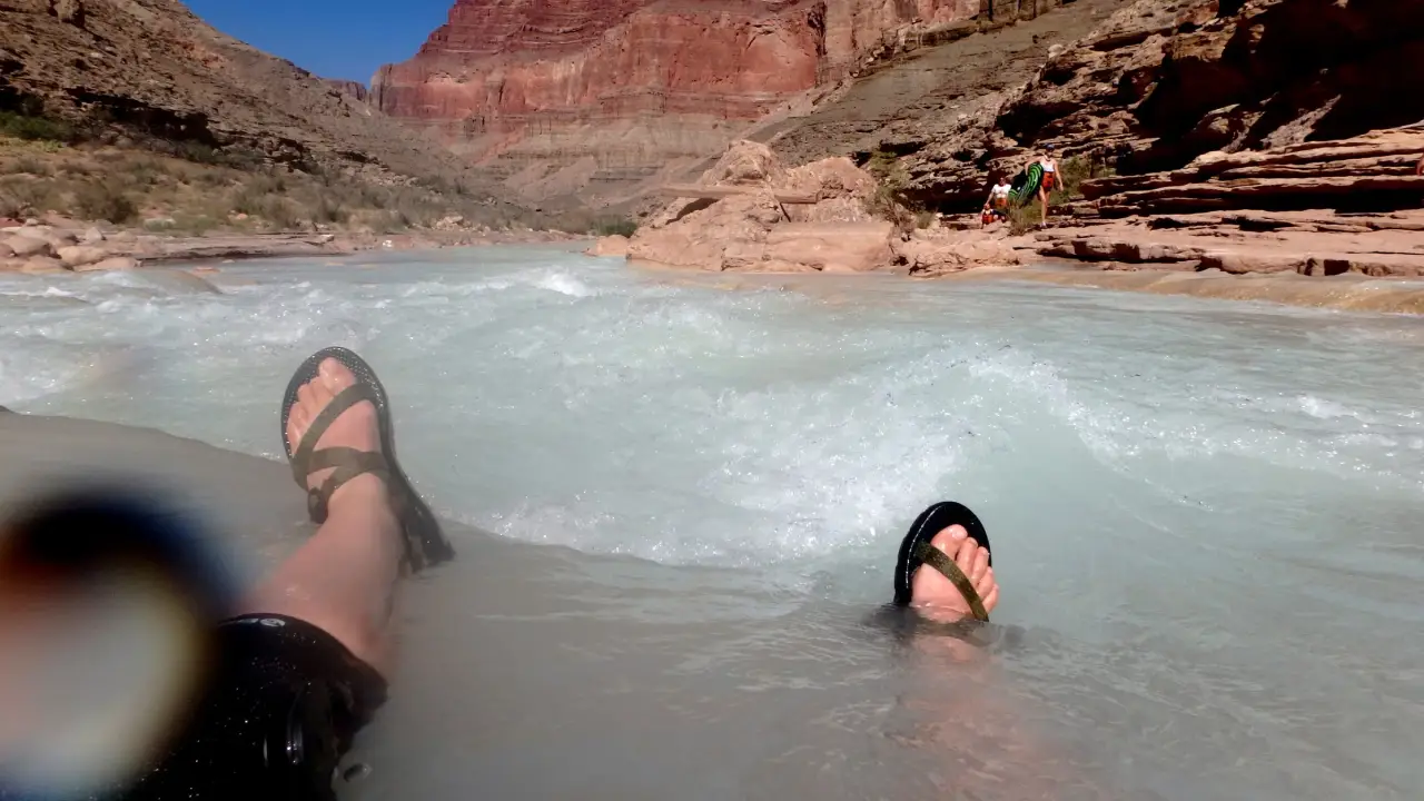 View of Little Colorado River with Feet showing in Sandles