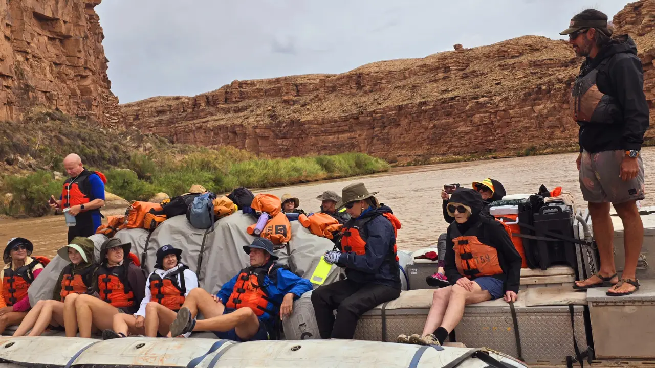 Many people on a raft from Hatch River Expeditions Grand Canyon Trip