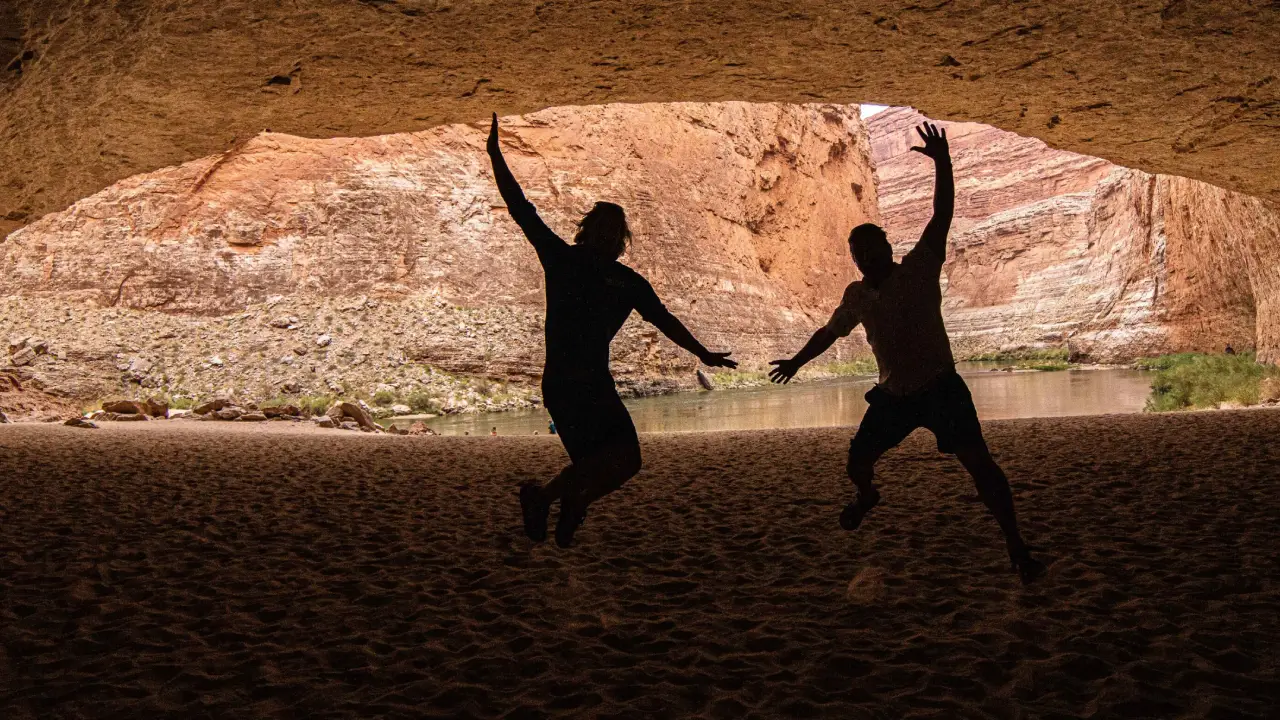 People playing in Redwall Cavern with Hatch River Expeditions