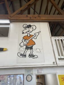 Hatch river rat picture hanging in warehouse