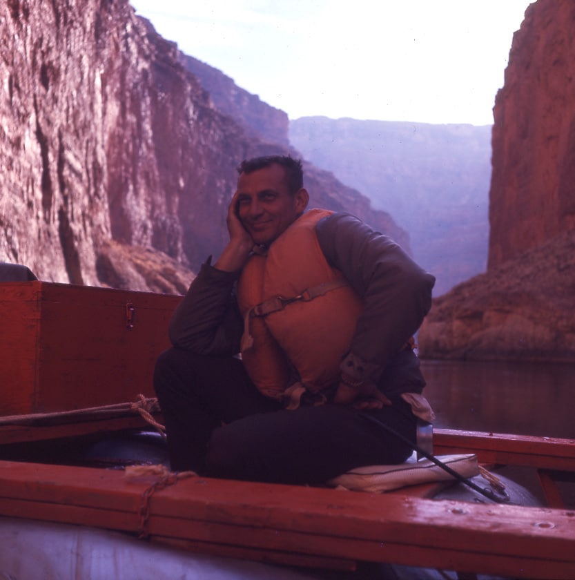 Hatch Guest poses for photo wearing lifejacket on boat