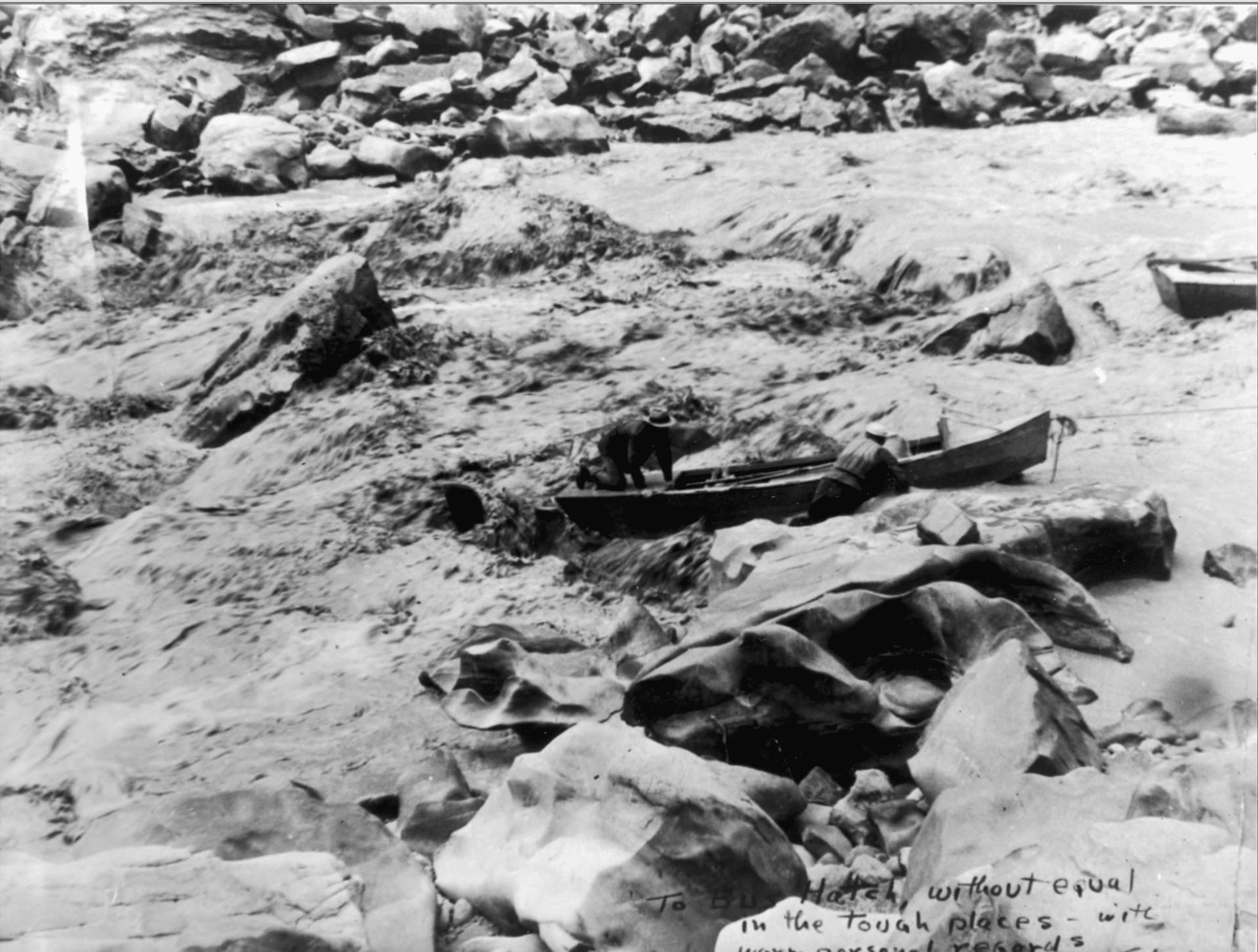 historical river running figure, Bus Hatch lining boat through rapids.