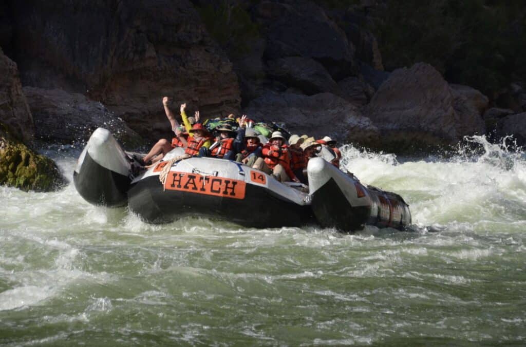 Hatch guests waving after rapid in recent years. 