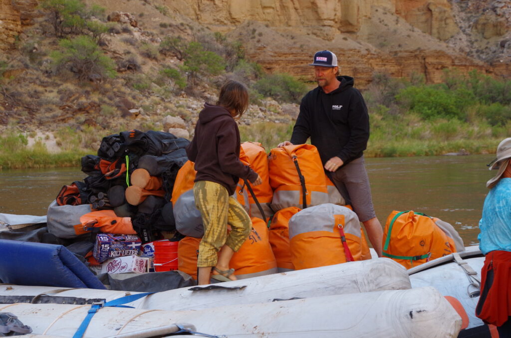 Loading Duffel bags on boat