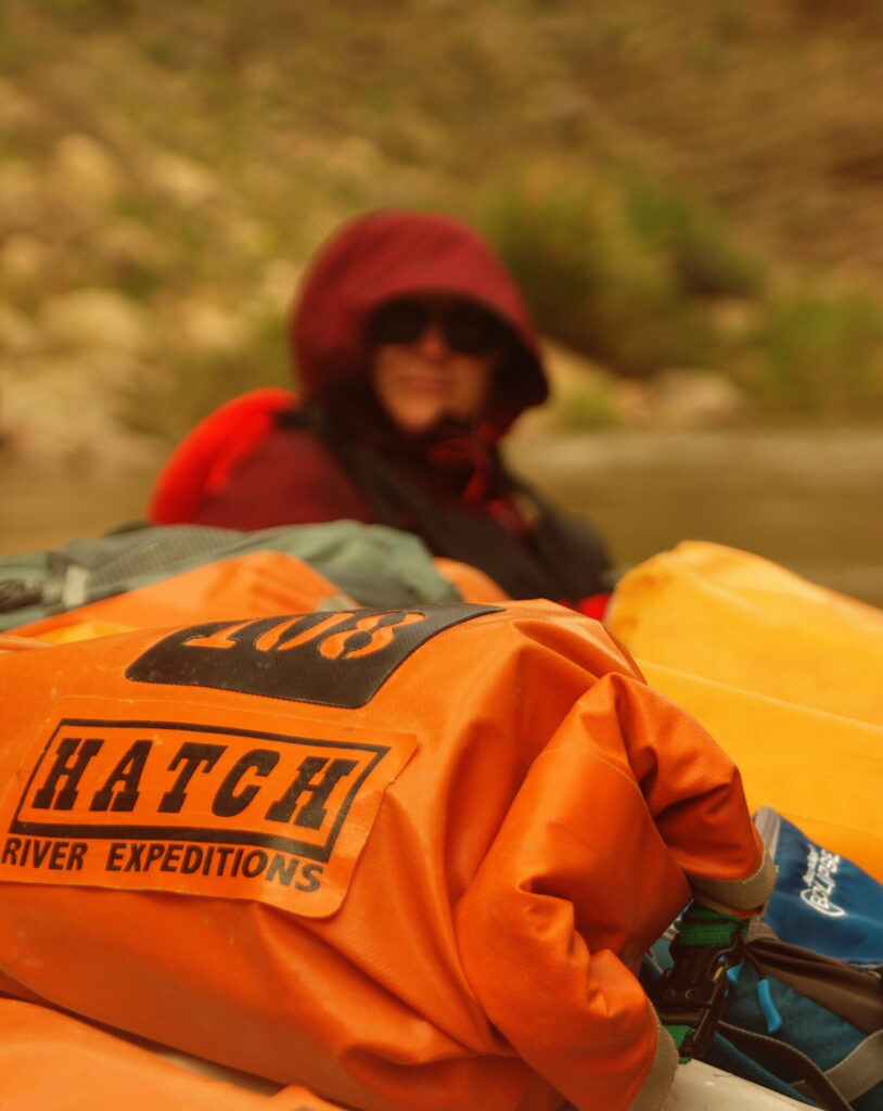 Day Bag in front of guest with rain gear on