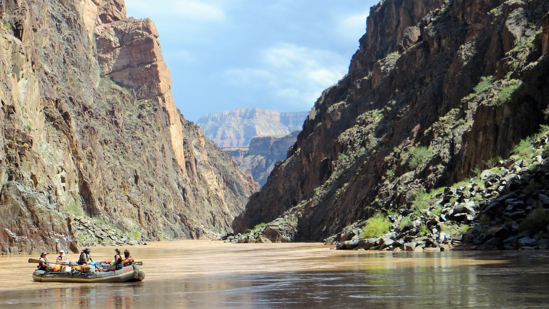 Photo of a Hatch raft on the river in Granite Gorge in Grand Canyon. Photo credit: Bill Morely.
