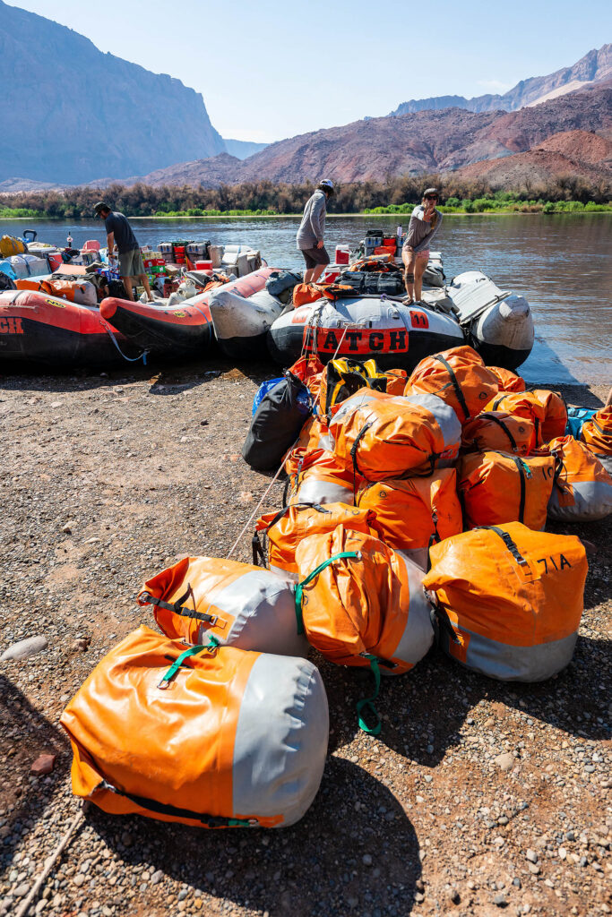 Gear getting packed onto a boat for a grand canyon river trip credit: Micheal Nuemann