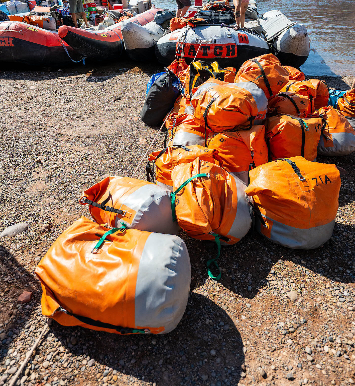 Dry bags made by Jack's (the company who made the rafts for Artemis II) getting packed credit: Micheal Nuemann