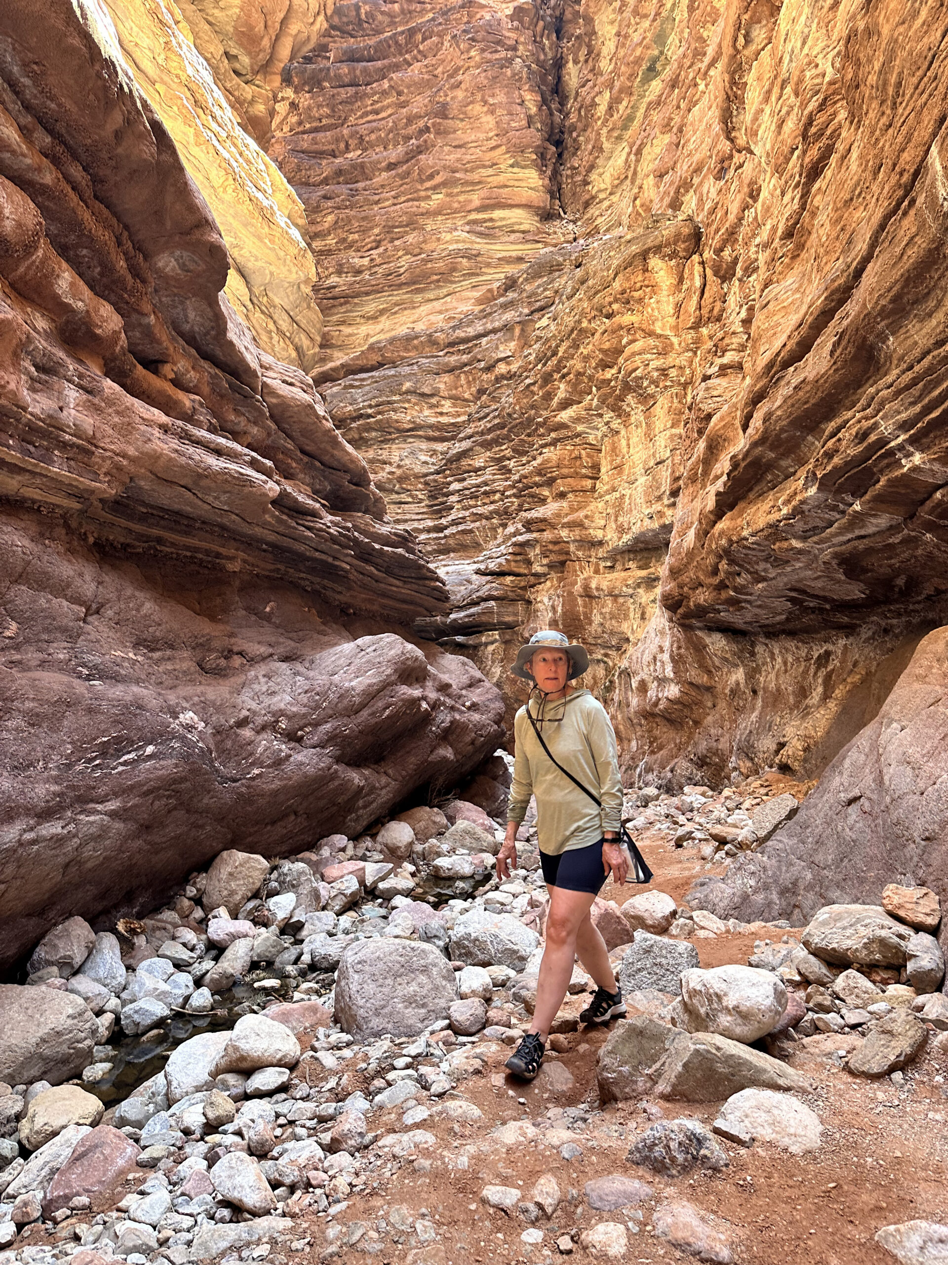 A Hatch guest hikes through a side canyon, as they explore Grand Canyon. 