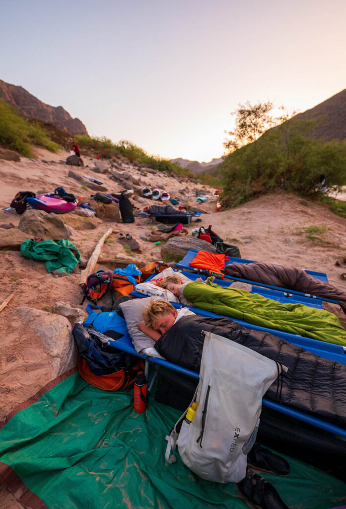 Kids sleeping on a Grand Canyon Rafting trip Credit: Micheal Nuemann