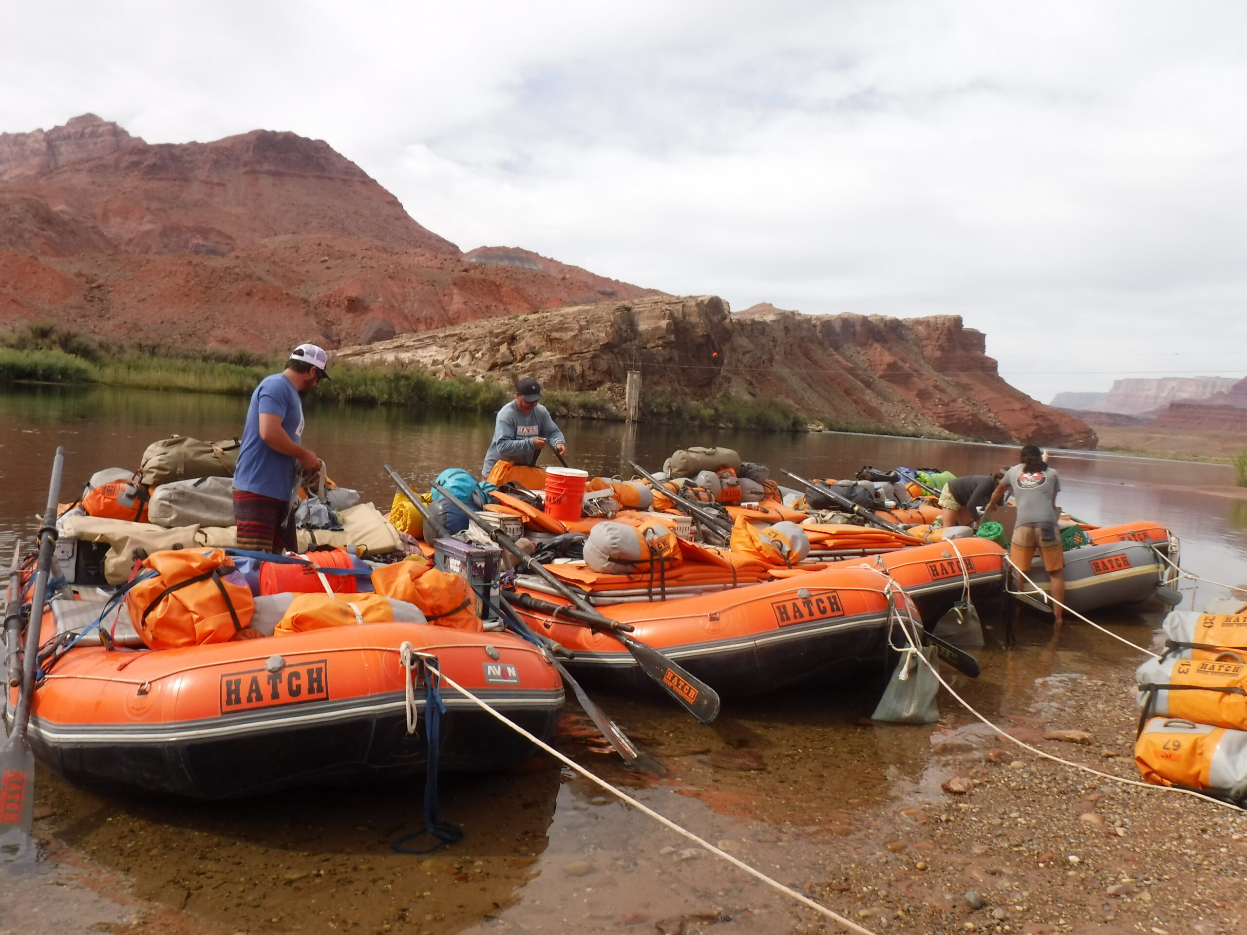 Hatch rafts lined up at Lees Ferry waiting to be loaded with passengers for the trip launch.