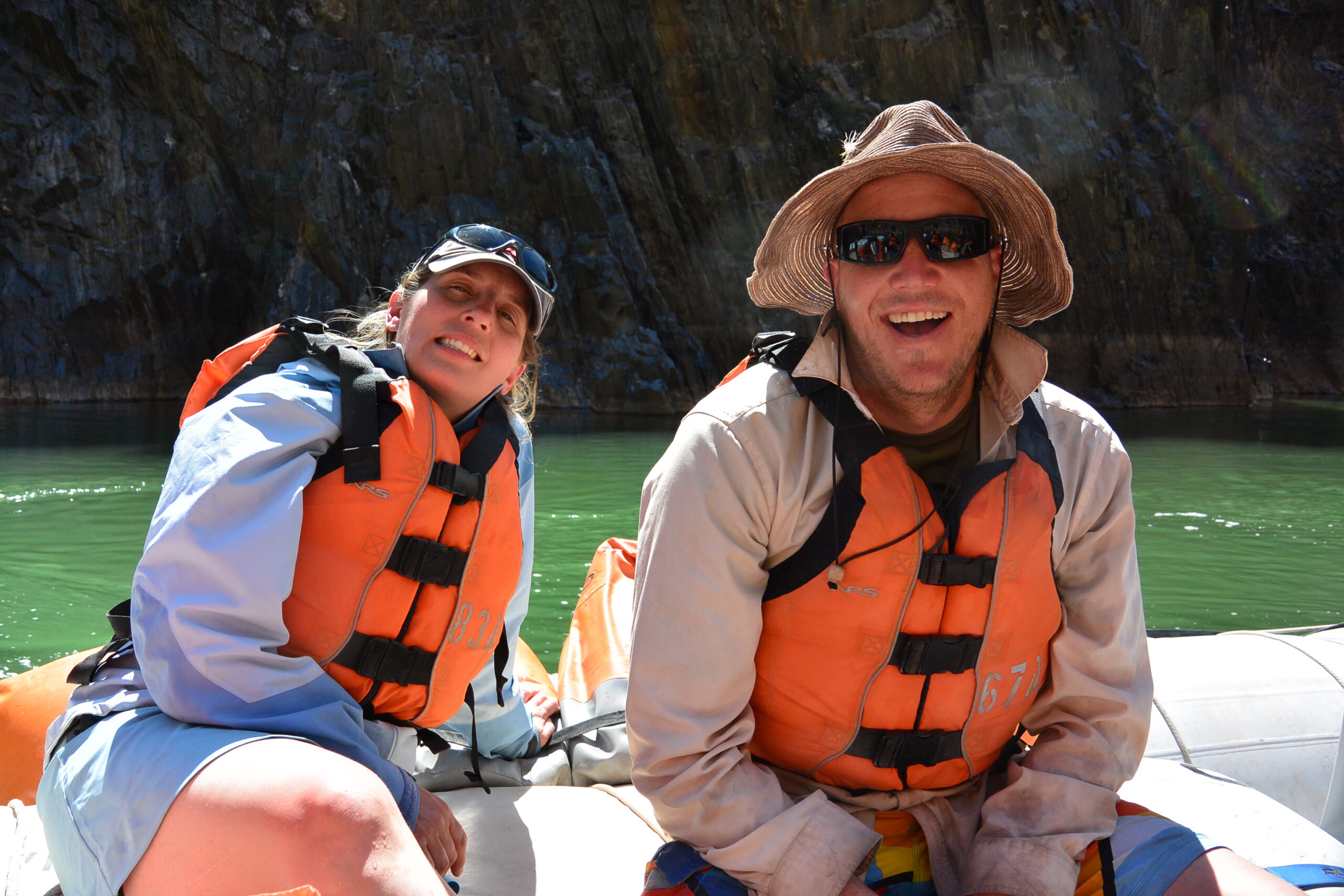 Guests smiling on a Hatch raft in the Grand Canyon. Photo credit: Morris Outwater.